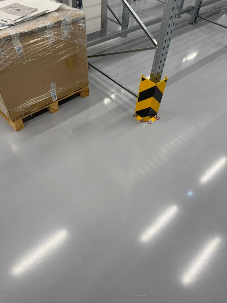 Beschichtete Fläche mit Rammschutz